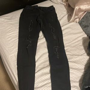 Black bluenotes jeans, with rips size 27 is what it says but probably 6 ish.
